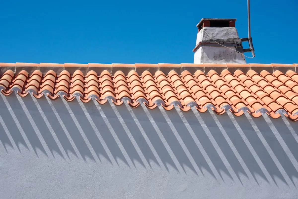 Roof ridge line and chimney on a home in Shreveport, LA